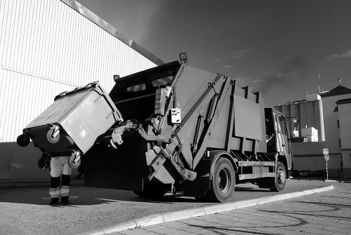 Residents disposing of household waste in Earls Court