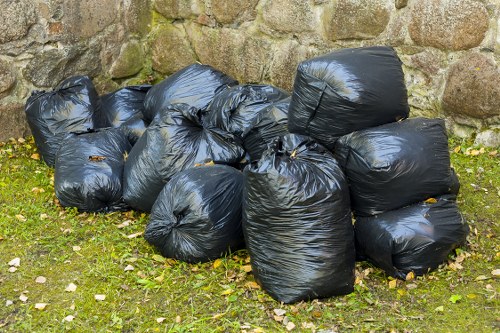Different types of business waste including recyclables and general waste.
