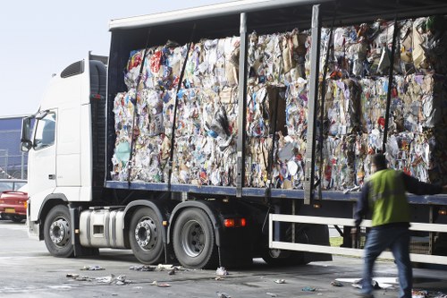 Team of house clearance experts at work in Earls Court